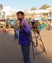 A Knife Sharpener with his tools