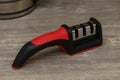 Knife Sharpener on the Kitchen Table Royalty Free Stock Photo