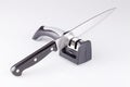Knife and sharpener Royalty Free Stock Photo