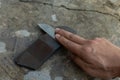 Knife sharpening on knife sharpening stone.