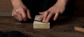 Knife sharpening with sharpening stone/block Royalty Free Stock Photo