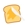 Knife spreading butter or margarine on slice of toast bread. Butter on toast