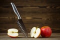 Knife. Stainless steel knife, apple. Chef or butcher knife. Professional equipment on kitchen. Knife for slice fruit, Royalty Free Stock Photo