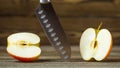Knife. Stainless steel knife, apple. Fruit Diet. Chef or butcher knife. Professional equipment on kitchen Royalty Free Stock Photo