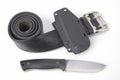 Knife for tourism and hunting with a plastic case on a black leather belt on a white background Royalty Free Stock Photo