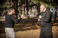 Knife vs knife fight. Kapap instructors demonstrates sombrada drill training