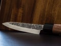 Knife with wood background damask Royalty Free Stock Photo