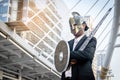 Knight businessman wearing an helm and steel sword. Royalty Free Stock Photo