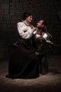 Knight giving a rose to lady Royalty Free Stock Photo