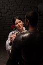 Knight giving a rose to lady Royalty Free Stock Photo