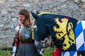 Knight with his horse at the end of the tournament