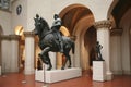 Knight on horseback in the hall of the medieval European sculpture Royalty Free Stock Photo