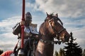 Knight on horseback. Horse in armor with knight holding lance. Horses on the medieval battlefield. Royalty Free Stock Photo