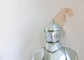 Knight, medieval suit and armor with mockup space of soldier, statue or honor on a gray studio background. Helmet, gear Royalty Free Stock Photo