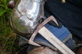 Knight`s equipment, hand in iron gauntlet, tournament, sword