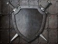 Knight shield and two swords over armor plates Royalty Free Stock Photo