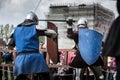 Knight tournament. The knights in the congregations are fighting in the ring. Public event in the city. Royalty Free Stock Photo