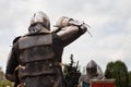 Knight tournament. The knights in the congregations are fighting in the ring. Public event in the city. Royalty Free Stock Photo