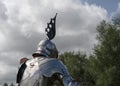 Knight wearing suit of armour read for jousting