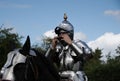 Knight wearing suit of armour read for jousting