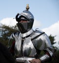 Knight wearing suit of armour read for jousting