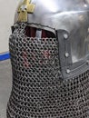 Knight's metal helmet with aventail chain mail.