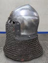 Knight's metal helmet with aventail chain mail.