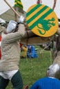 Knights in Battle with Silver Helmets and Shields Royalty Free Stock Photo