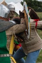 Knights in Battle with Silver Helmets and Shields