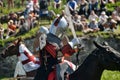 Knights fighting on horseback