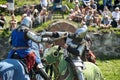 Knights fighting on horseback