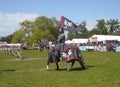 Knights on horses with banners and dress at a show in Ireland stallion donkey pony Clydesdale dual Gard 1 Royalty Free Stock Photo