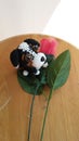 Knit dog red rose Royalty Free Stock Photo