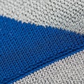 Knit pattern is dense and regular, forming a diagonal division between Royalty Free Stock Photo