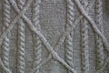 Knit texture with cable knit aran gray background Royalty Free Stock Photo