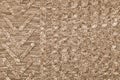 Knit texture of natural soft wool knitted fabric brown melange background