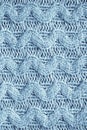Knit texture of natural soft wool knitted fabric light blue background