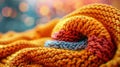 Warm and Textured Knitted Fabric in Shades of Orange, Red, and Blue Creating Abstract Pattern Royalty Free Stock Photo