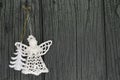 Knitted angel and xmas tree for christmas greetings card, and christmas