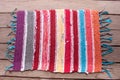 Knitted bright handmade rug. Home hobby Royalty Free Stock Photo