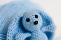 knitted bunny. blue bunny from yarn.