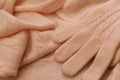Knitted cashmere texture background. Cashmere scarf and gloves. Royalty Free Stock Photo