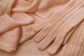 Knitted cashmere texture background. Cashmere scarf and gloves. Royalty Free Stock Photo