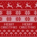 Knitted Christmas sweater pattern with deers, fir-trees, snowflakes. Winter fabric background. Royalty Free Stock Photo