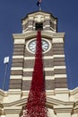 Knitted and crocheted poppies cascading down the council chambers for ANZAC Day, Narrandera, NSW, Australia Royalty Free Stock Photo