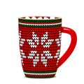 Knitted cup with a Scandinavian pattern and hot chocolate and marshmallows.