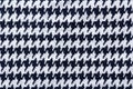 Knitted fabric jersey texture with goose foot pattern macro Royalty Free Stock Photo