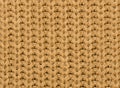 Knitted fabric texture in autumn color. Abstract background. Close-up Royalty Free Stock Photo