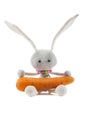 Knitted gray rabbit with carrot Royalty Free Stock Photo