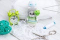 a knitted kitten with knitting needles, colored balls of thread in a basket. Royalty Free Stock Photo